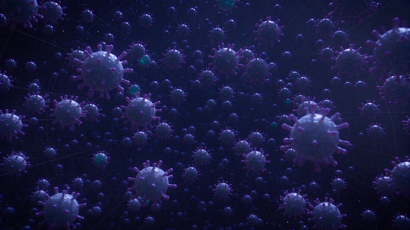 Renderizado macro de partículas virales sobre fondo oscuro.